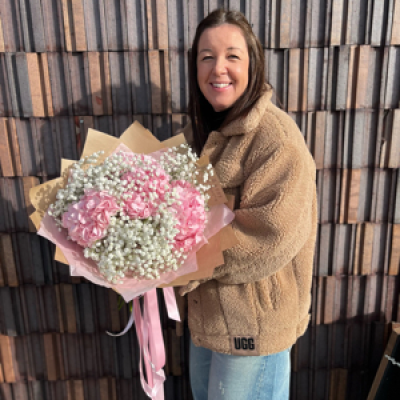 Gypsophila cloud - A delicate ‘cloud’ of Gypsophila & hydrangeas wrapped in Kraft paper & finished off with trailing satin ribbon.
