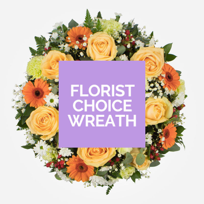 Florists Choice Open Wreath - The wreath will be arranged by a professional florist using the loveliest collection of flowers and foliage of the day .Colours and requested flowers cannot be guaranteed..